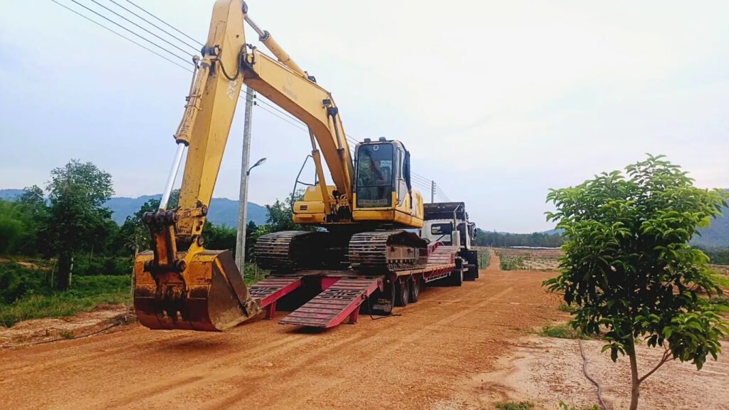 รับจ้างย้ายแม็คโครบ่อวิน